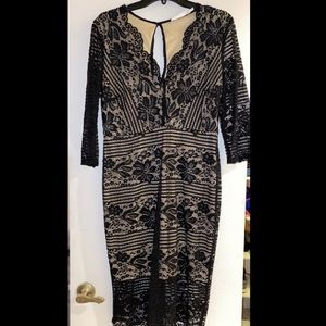 Lulu’s black lace low cut dress